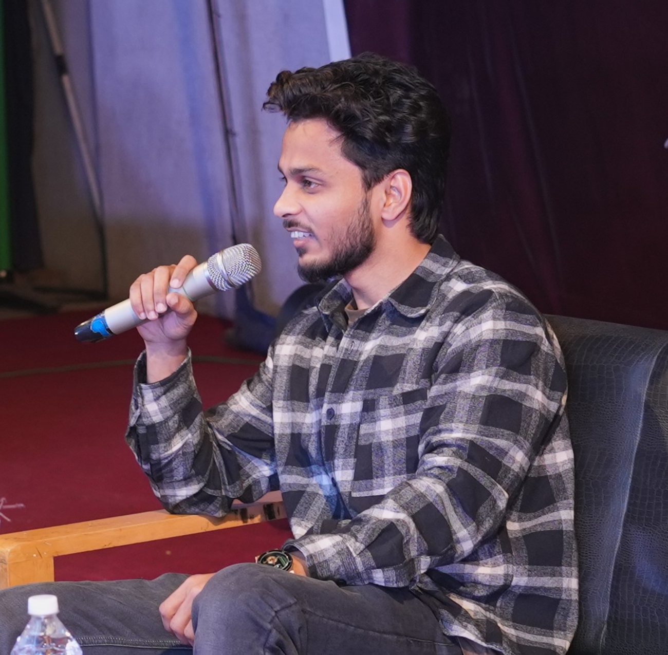 Hassan Ansari speaking at a HackproofHacks workshop